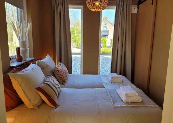 Сasa de vacaciones Bohemian Wellness Met Hottub & Sauna Ewijk